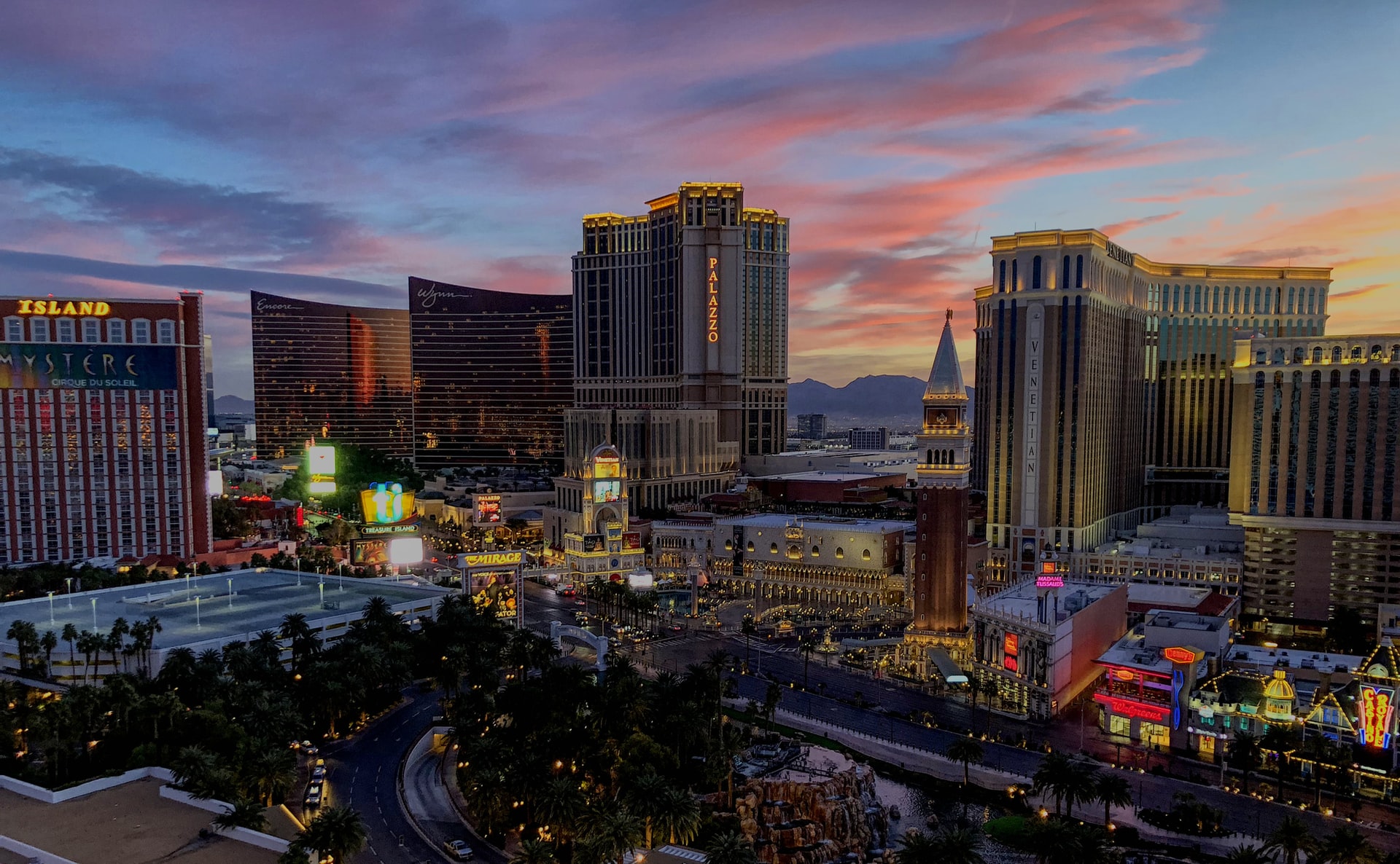 Image description: The Las Vegas skyline at sunset. End of alt text. 