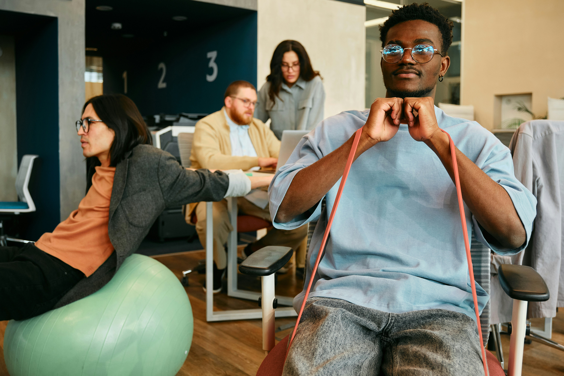 team members work out at the office